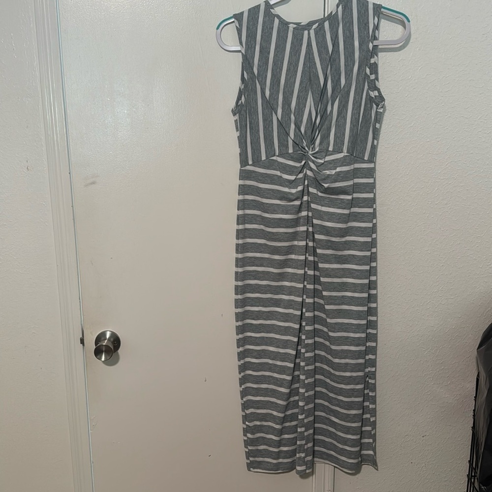 Very cute like new gray and white dresss  worn a couple of times like new